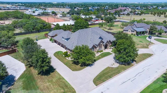 an aerial view of a city with lots of residential buildings