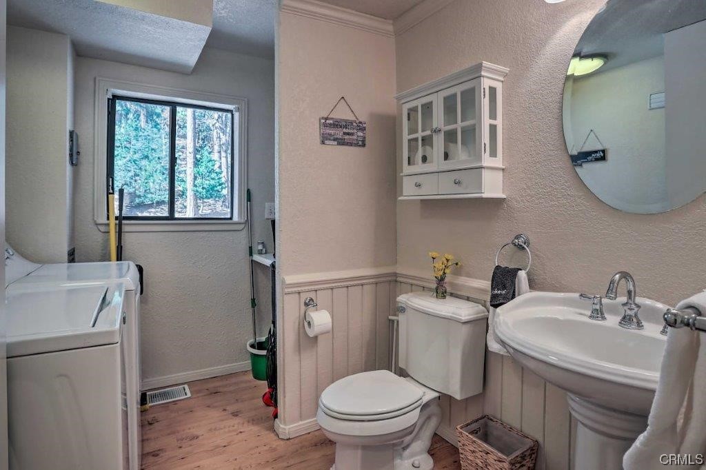 1017 Burnt Mill Road Lake Arrowhead, CA 92352 - Photo 13 of 32 a bathroom with a sink toilet and a mirror