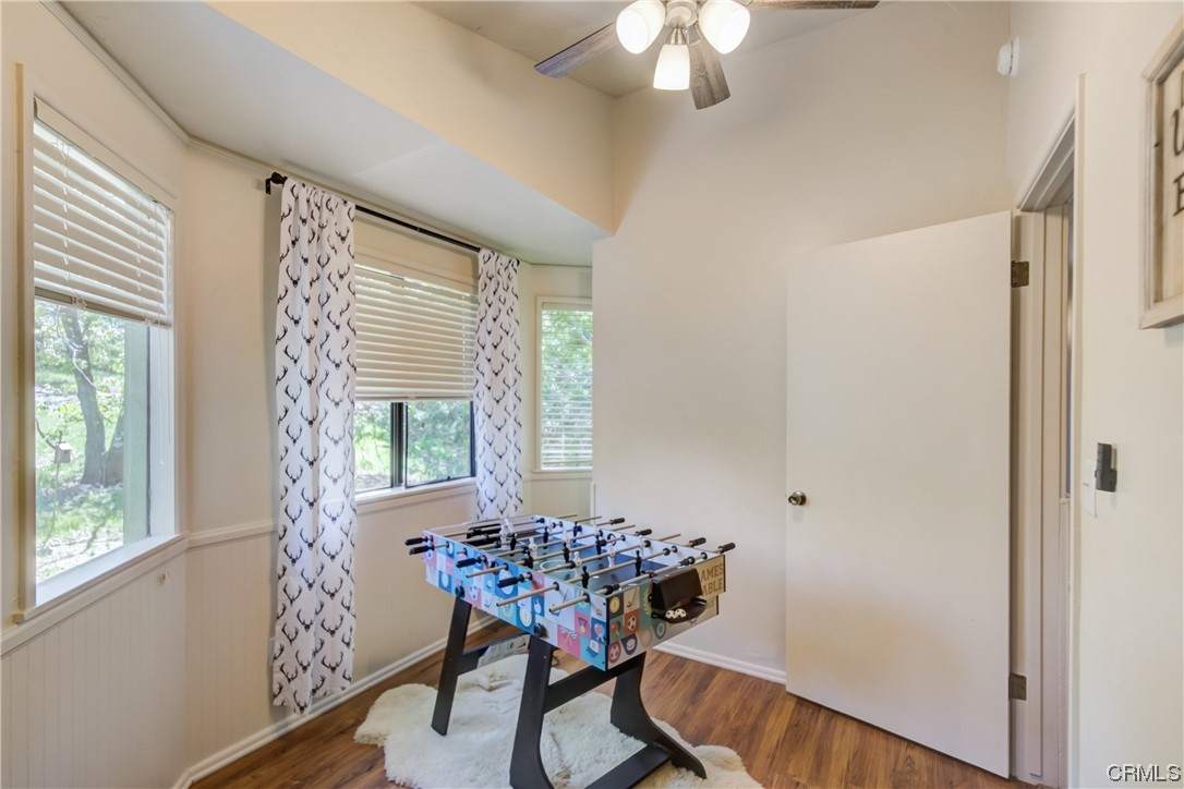 1017 Burnt Mill Road Lake Arrowhead, CA 92352 - Photo 20 of 32 a living room with furniture and a large window