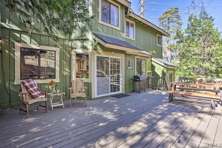 1017 Burnt Mill Road Lake Arrowhead, CA 92352 - Photo 26 of 32 a view of a brick house with a chairs and table in a patio