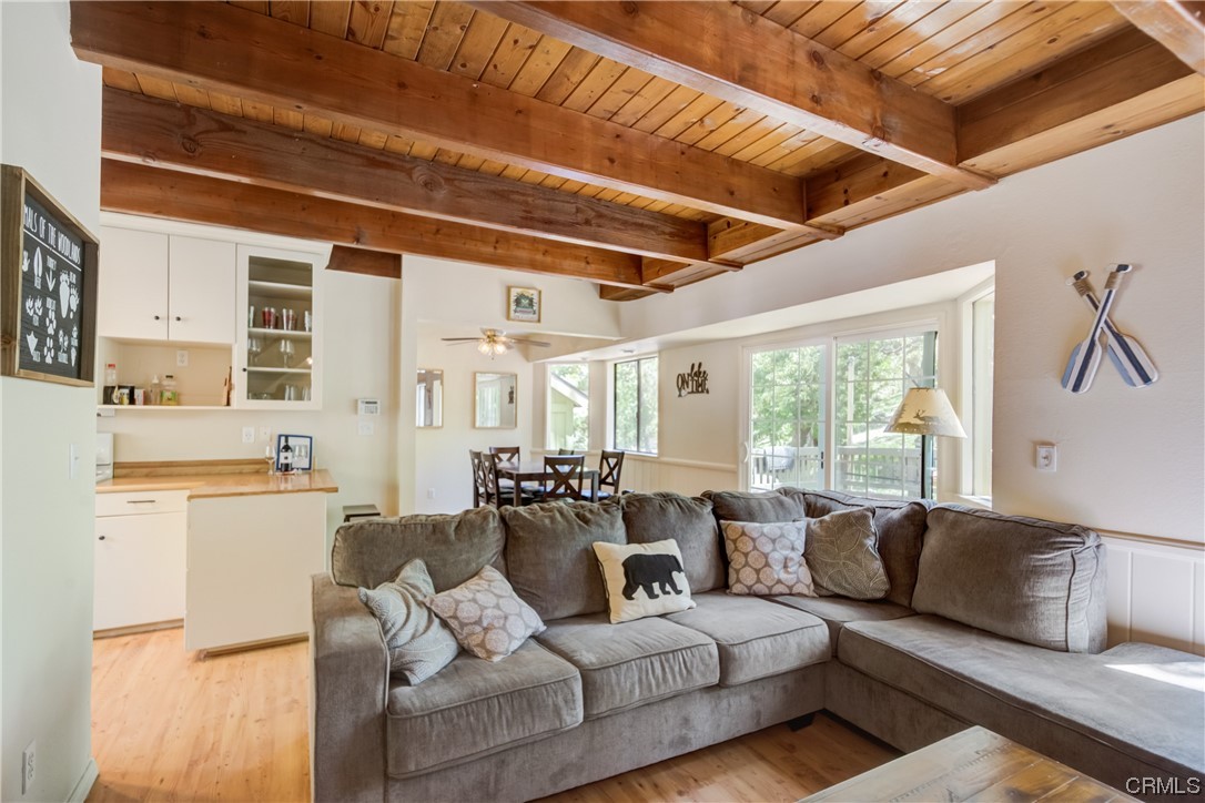 1017 Burnt Mill Road Lake Arrowhead, CA 92352 - Photo 4 of 32 a living room with furniture and a large window