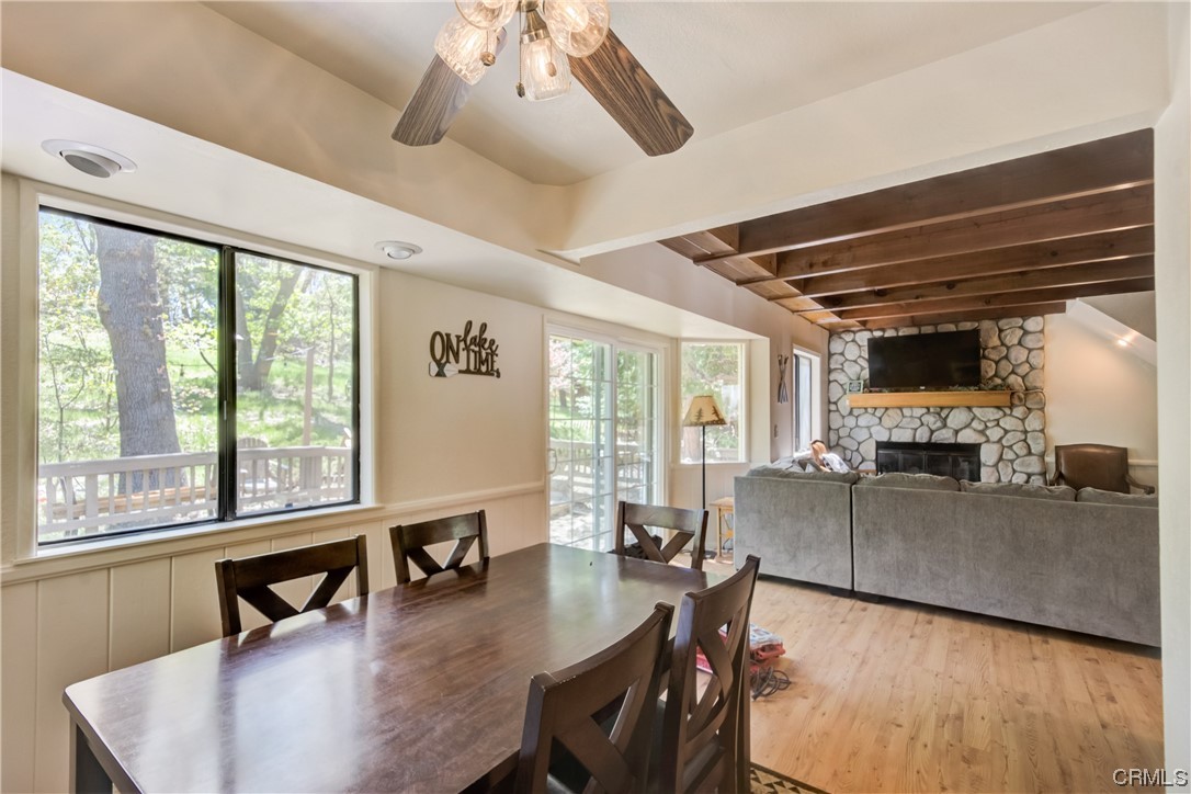 1017 Burnt Mill Road Lake Arrowhead, CA 92352 - Photo 10 of 32 a living room with furniture and a large window