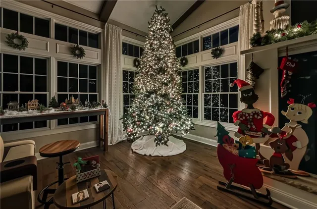 a view of a chairs and a table in the balcony