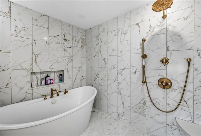 a bathroom with a sink and a shower