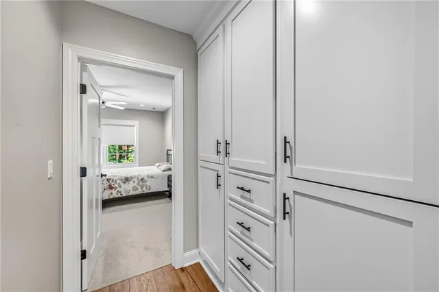 a view of bedroom with wooden floor