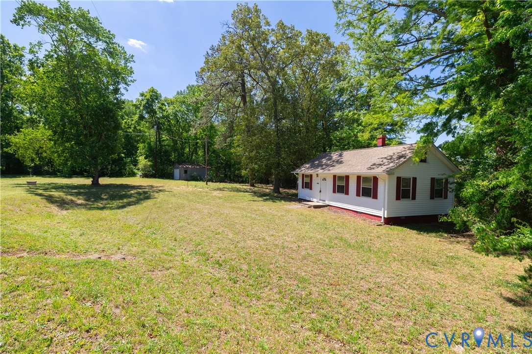 933 Pleasant Point Road Surry, VA 23883 - Photo 22 of 45 a swimming pool with trees in the background