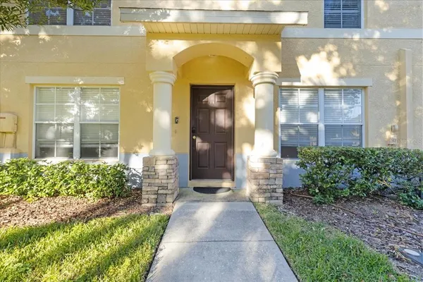 a front view of a house with a glass door