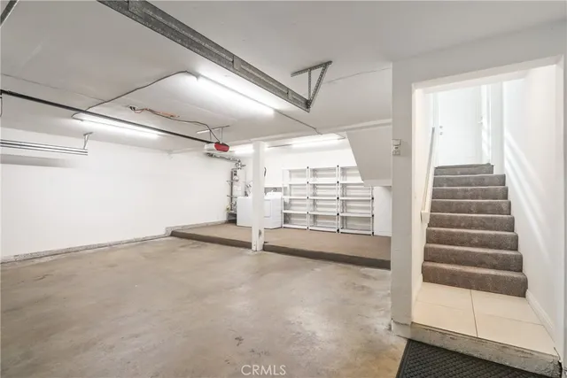 a view of an empty room with a garage
