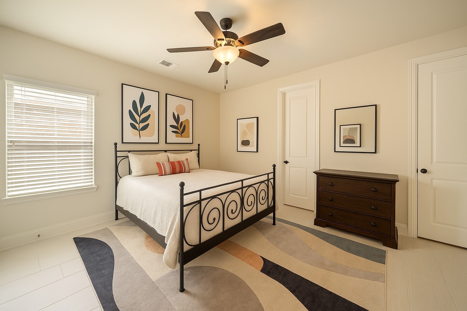 17610 Astrachan Road Richmond, TX 77407 - Photo 19 of 25 a spacious bedroom with a bed and a window