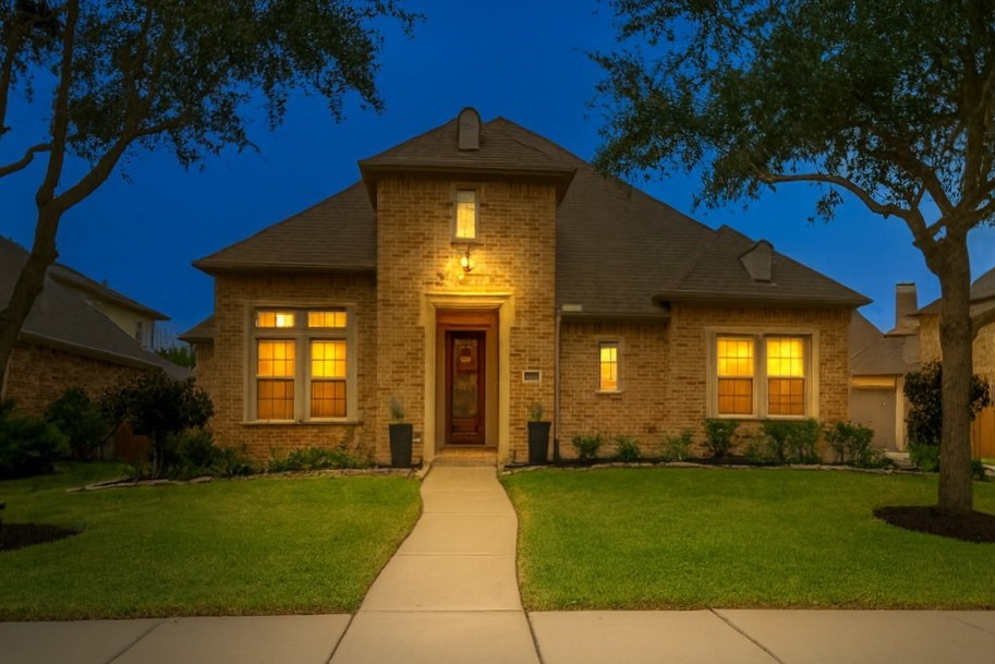 17610 Astrachan Road Richmond, TX 77407 - Photo 25 of 25 a view of a house with a yard