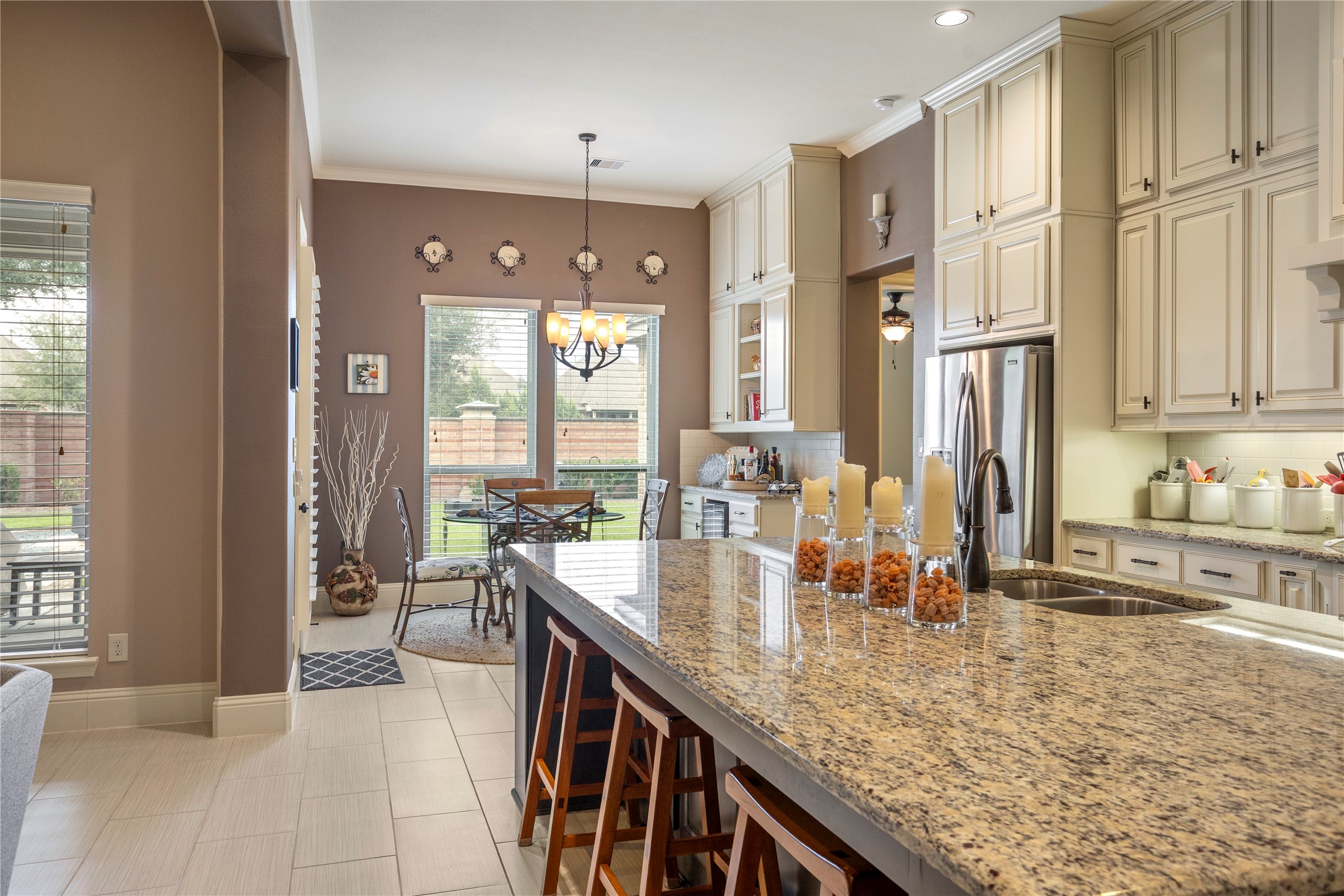 17610 Astrachan Road Richmond, TX 77407 - Photo 10 of 25 a kitchen with stainless steel appliances granite countertop a sink and cabinets