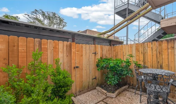 a view of a backyard with plants