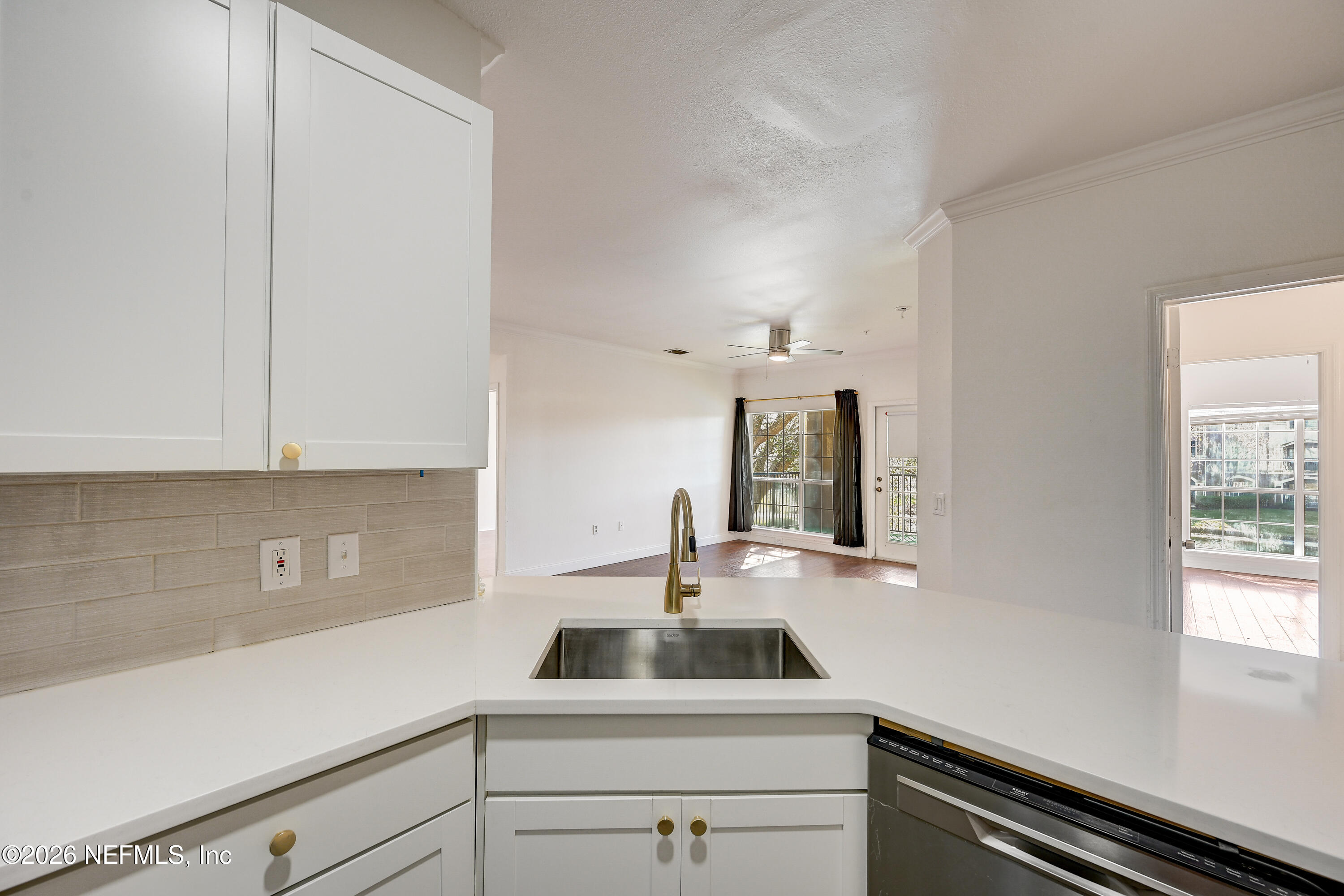10961 Burnt Mill Road, Unit 824 Jacksonville, FL 32256 - Photo 7 of 35 a kitchen with a sink and cabinets