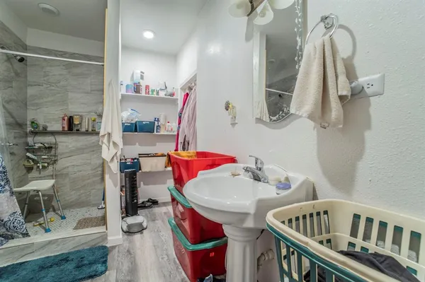 a bathroom with a sink and a mirror