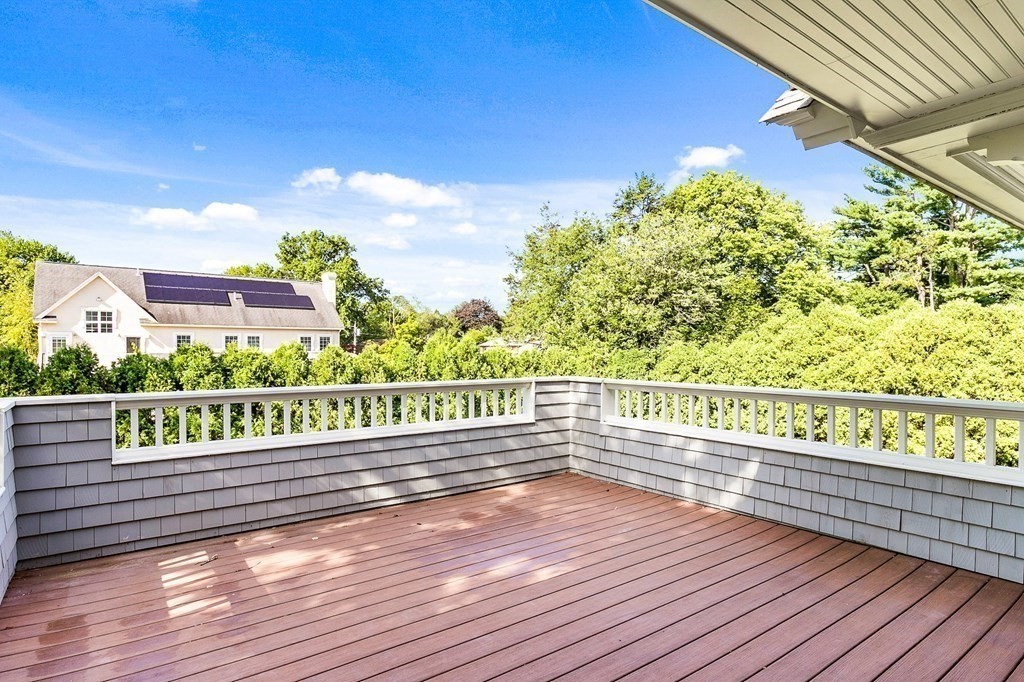 203 Old Farm Road Newton, MA 02459 - Photo 13 of 24 a view of a balcony with wooden floor