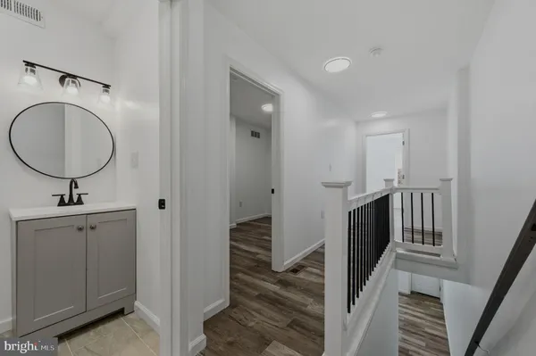 a view of a hallway with washer and dryer