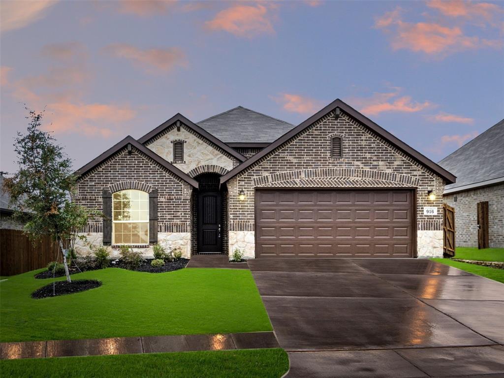 916 Misty Lane Cleburne, TX 76033 - Photo 1 of 1 a front view of a house with a yard