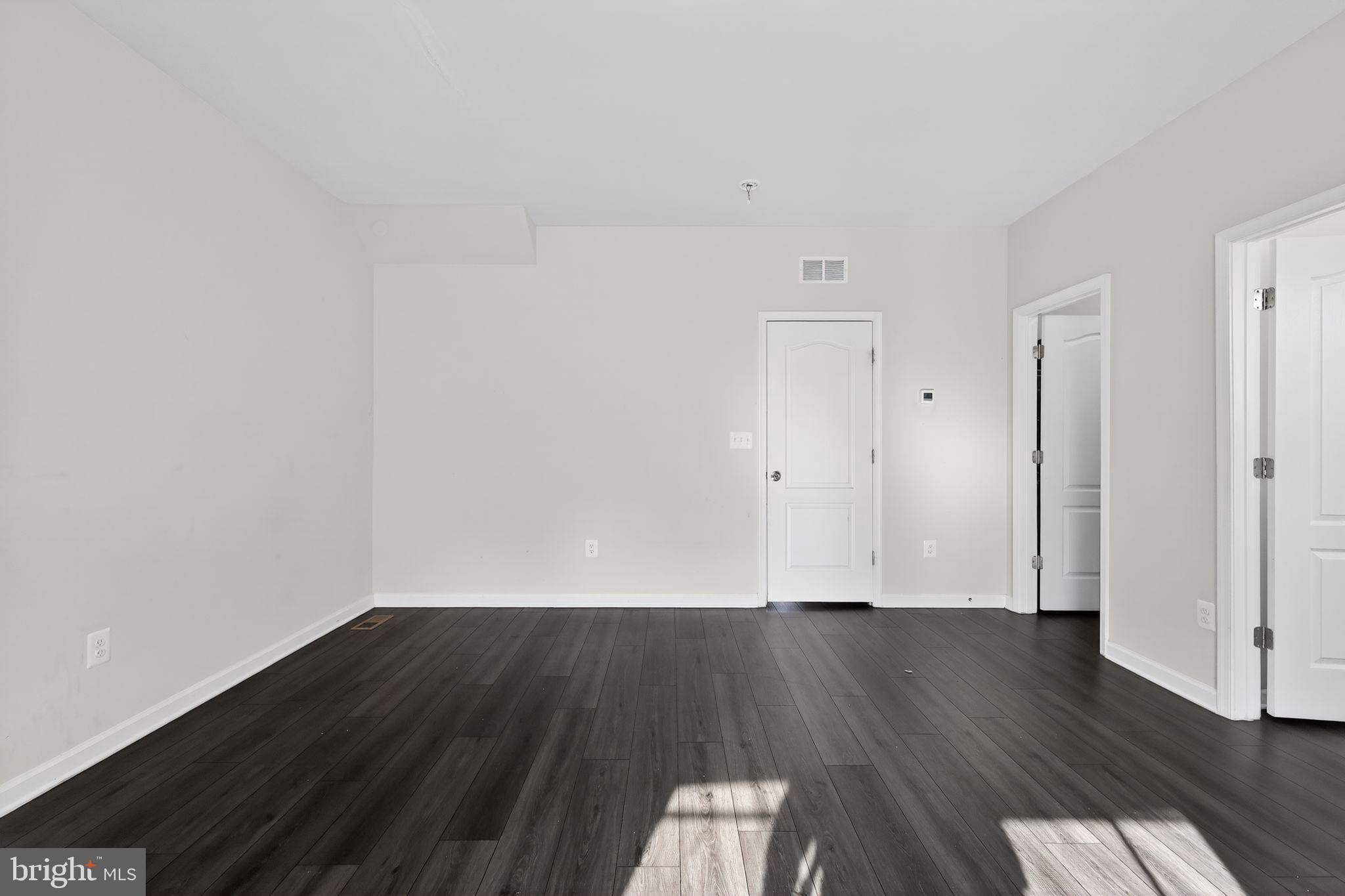 1027 Overlook Way Laurel, MD 20707 - Photo 12 of 30 a view of wooden floor and wooden floor in a room