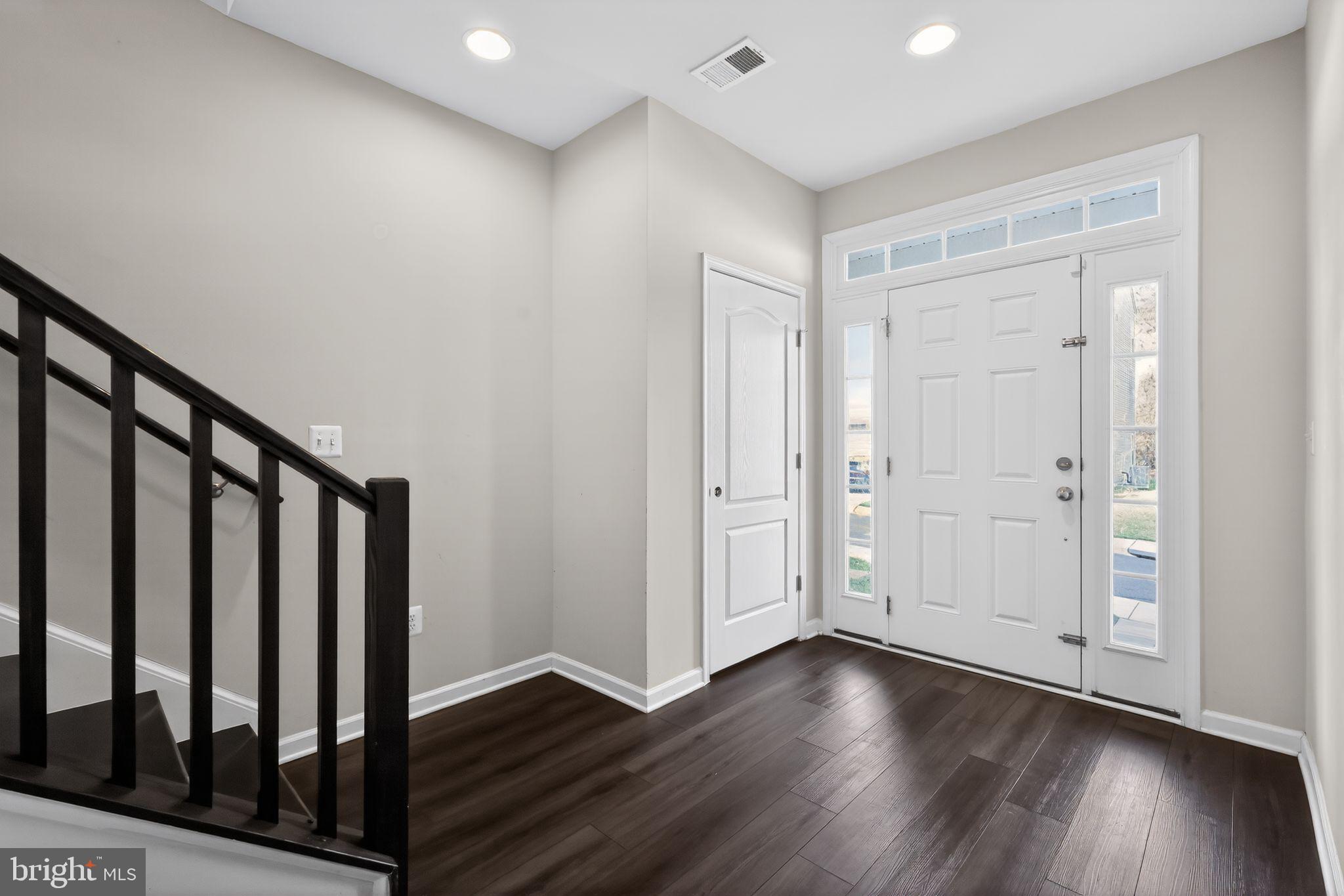 1027 Overlook Way Laurel, MD 20707 - Photo 2 of 30 wooden floor in an empty room