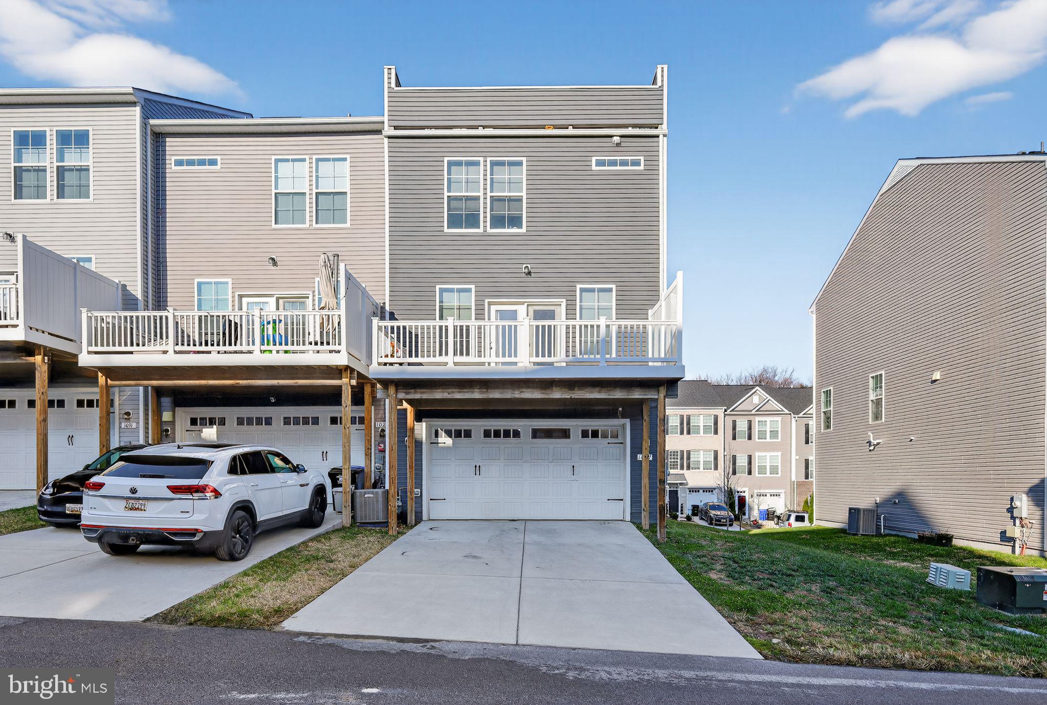 1027 Overlook Way Laurel, MD 20707 - Photo 28 of 30 a car parked in front of a building