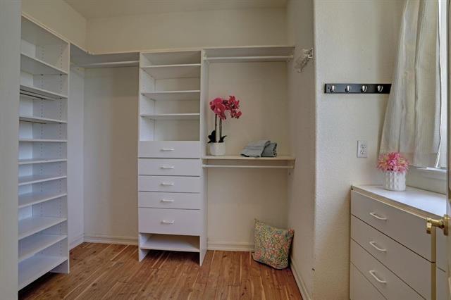 8916 Visage Circle Fair Oaks, CA 95628 - Photo 5 of 15 a view of a hallway with closet and wooden floor