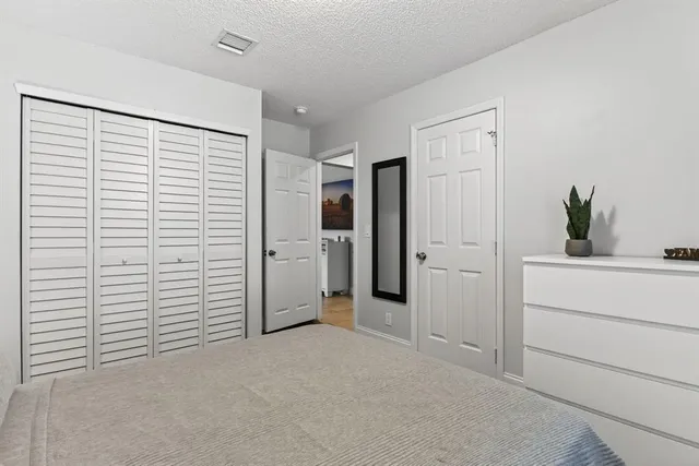 a view of a bathroom with closet