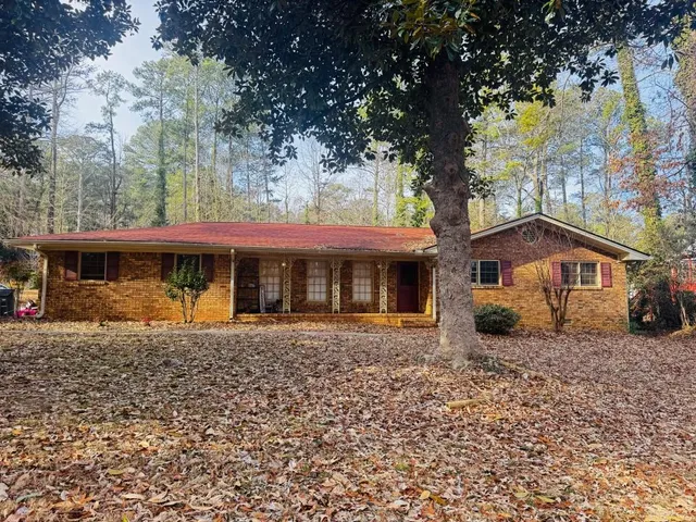 front view of a house with a trees