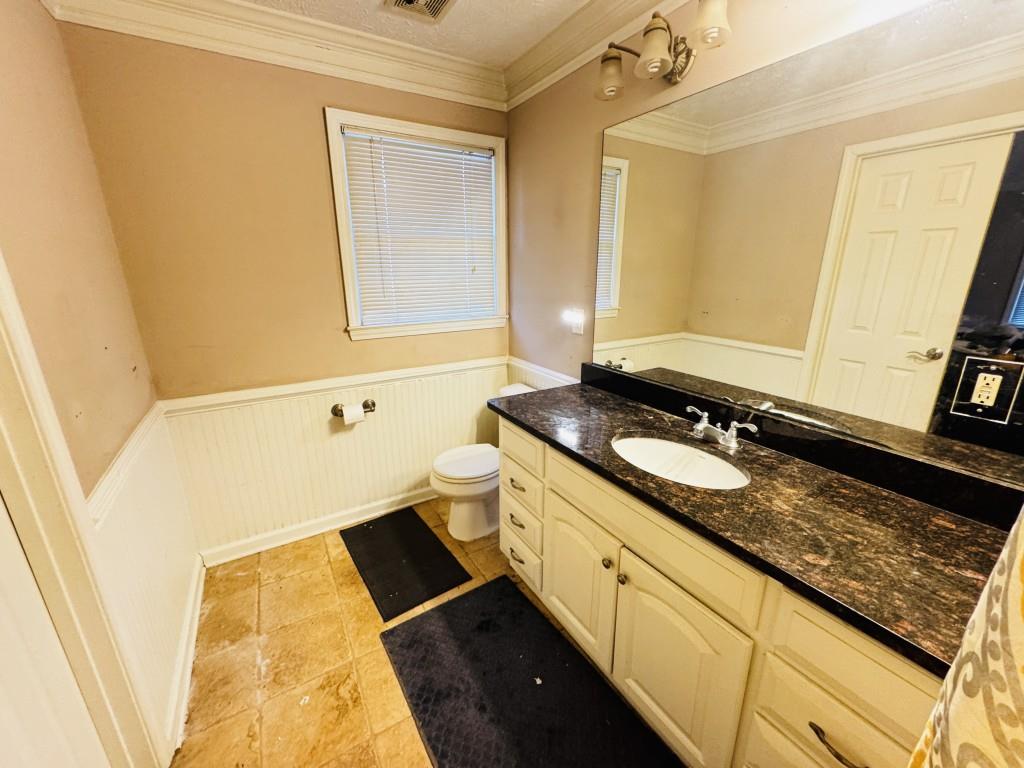 2359 Valley Way Snellville, GA 30078 - Photo 14 of 26 a bathroom with a granite countertop sink and a mirror
