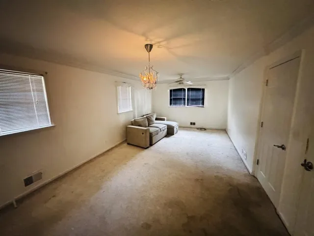 a view of a livingroom with furniture
