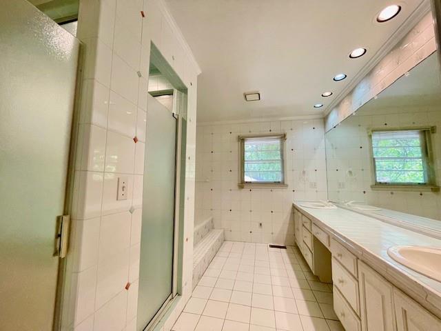 2396 Lavista Road Northeast Atlanta, GA 30329 - Photo 13 of 28 a spacious bathroom with a bathtub sink and mirror