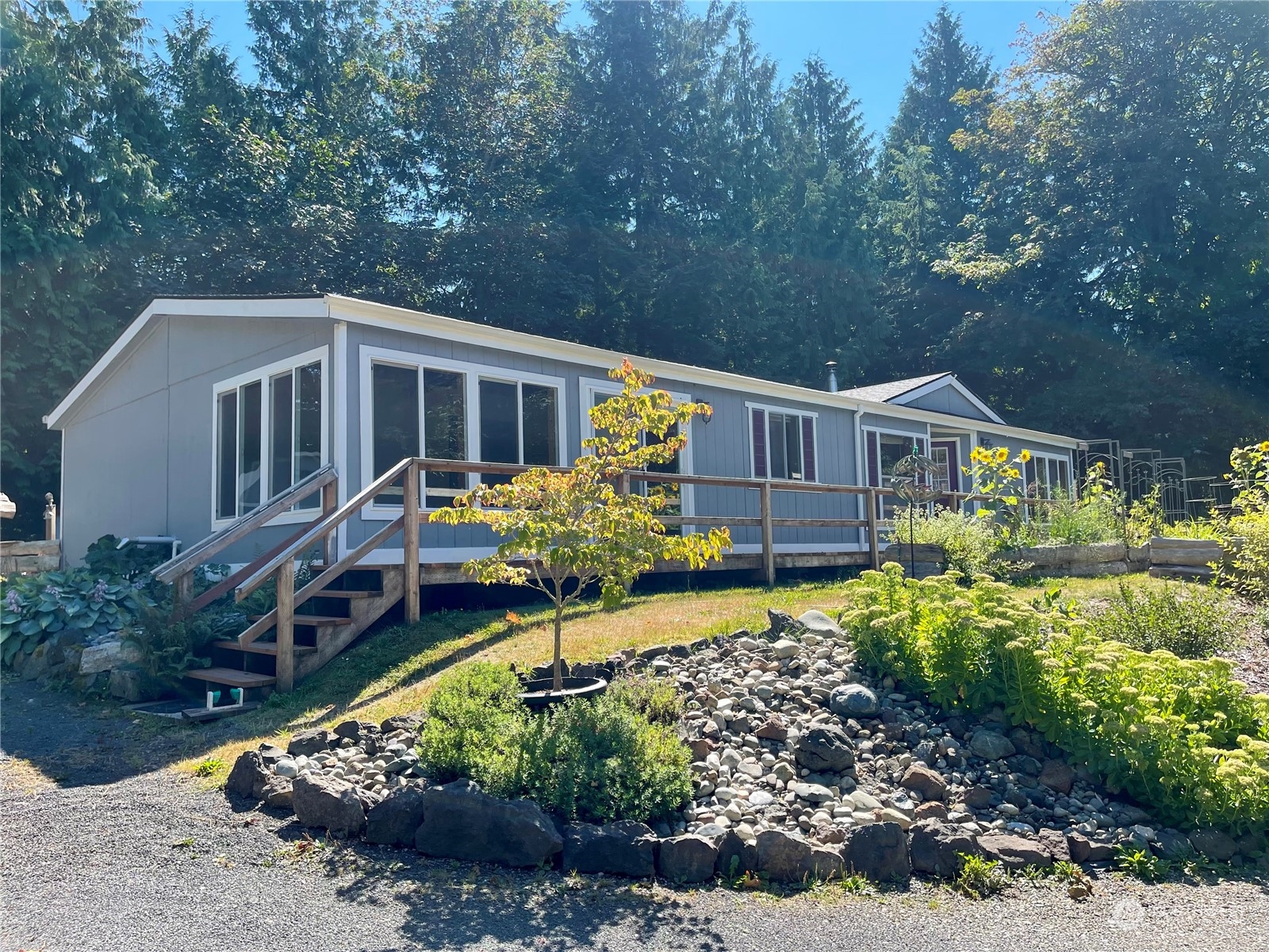 2090 Anderson Lake Road Chimacum, WA 98325 - Photo 1 of 25 a house with trees in the background