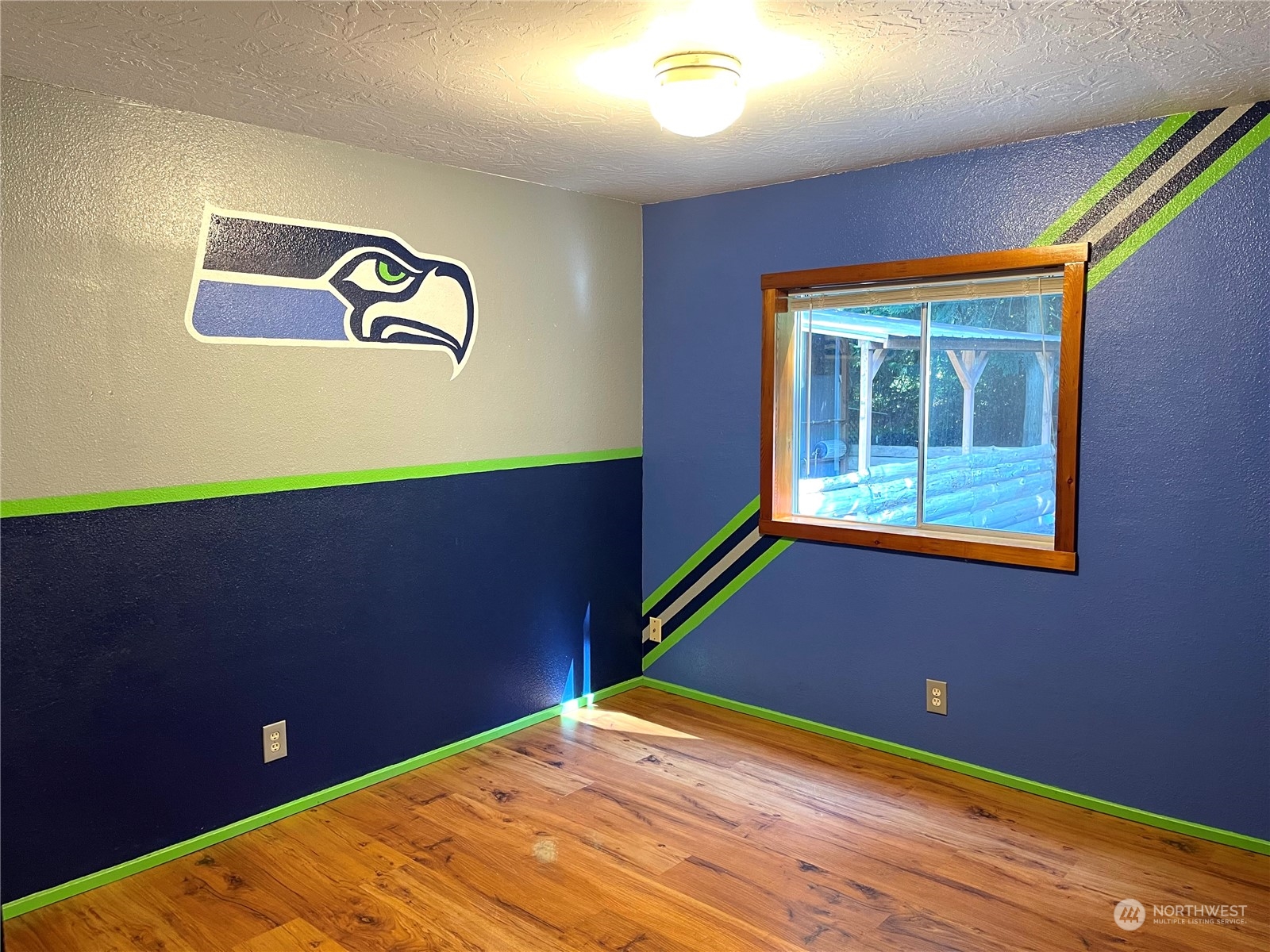 2090 Anderson Lake Road Chimacum, WA 98325 - Photo 16 of 25 a view of an empty room with a window
