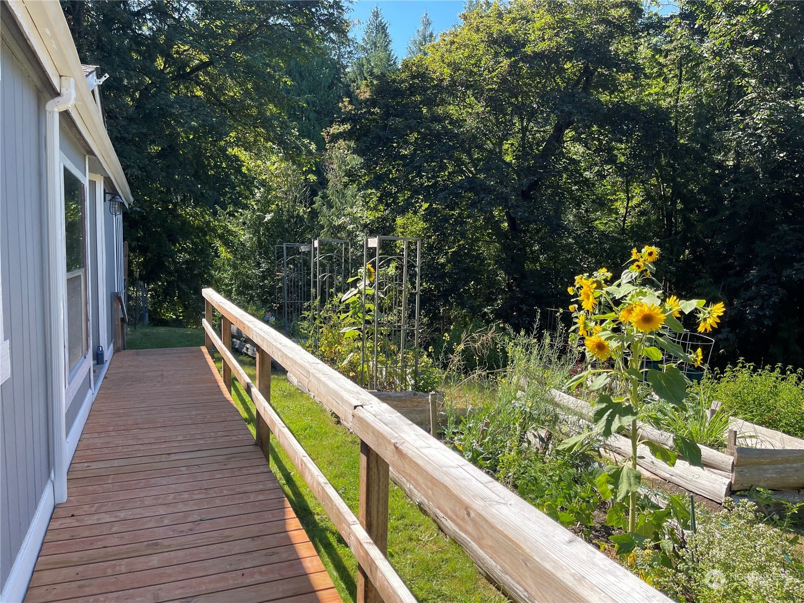 2090 Anderson Lake Road Chimacum, WA 98325 - Photo 25 of 25 a view of balcony with wooden floor and fence