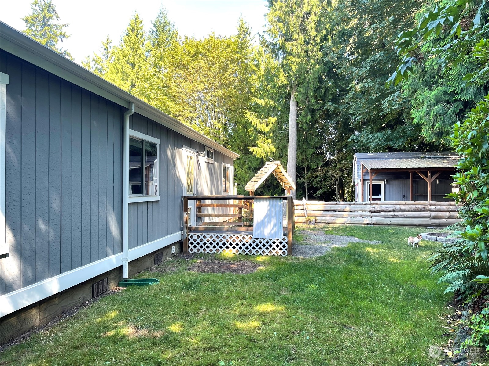2090 Anderson Lake Road Chimacum, WA 98325 - Photo 5 of 25 a front view of a house with garden