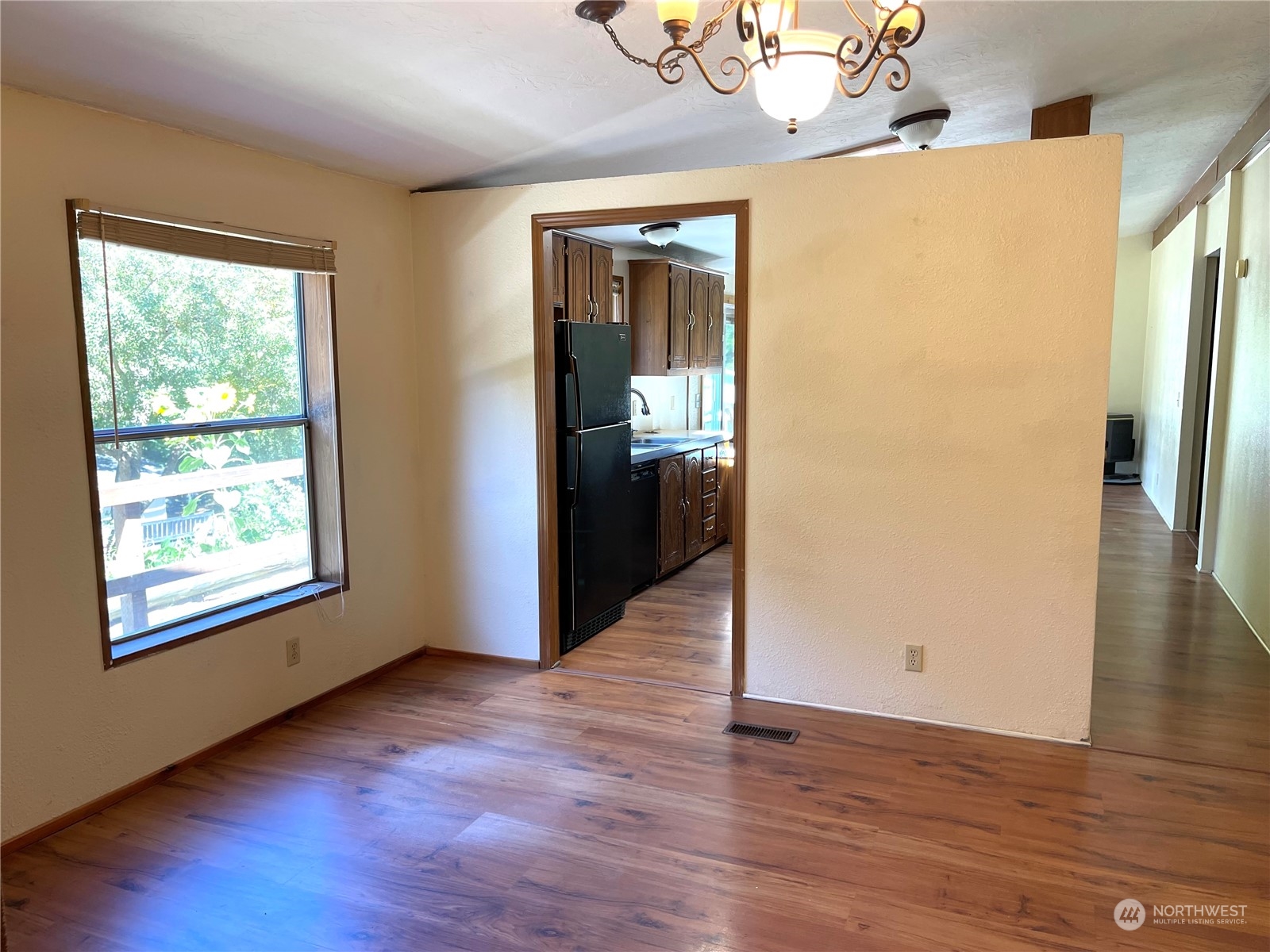 2090 Anderson Lake Road Chimacum, WA 98325 - Photo 9 of 25 wooden floor in an empty room with a window