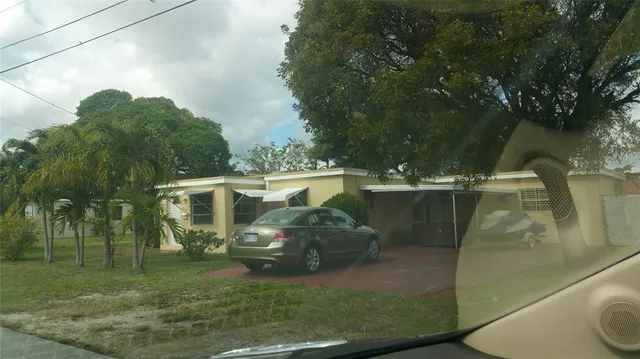 a view of outdoor space and yard