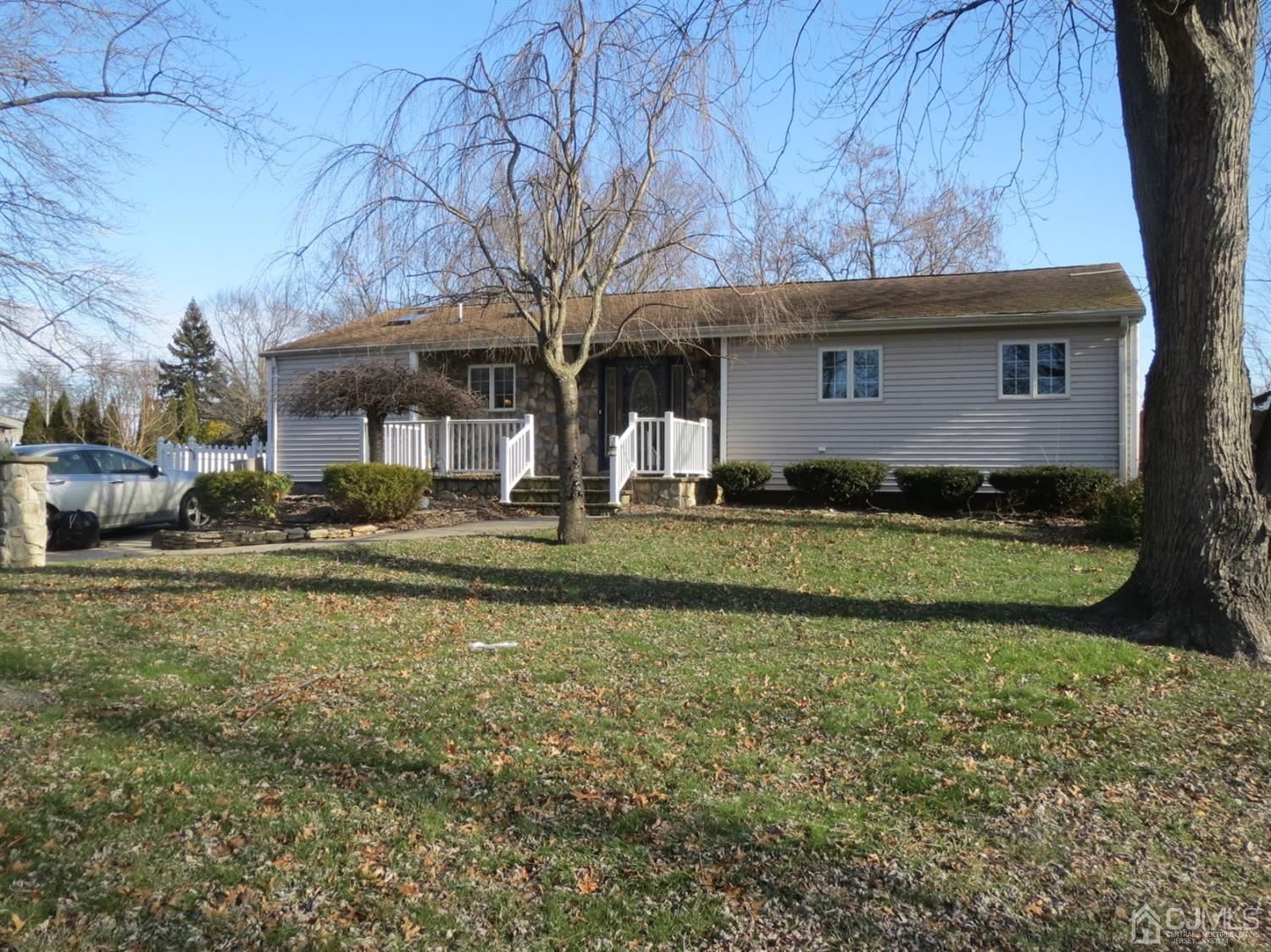 43 Princeton Road Old Bridge, NJ 08859 - Photo 1 of 26 a front view of a house with a yard