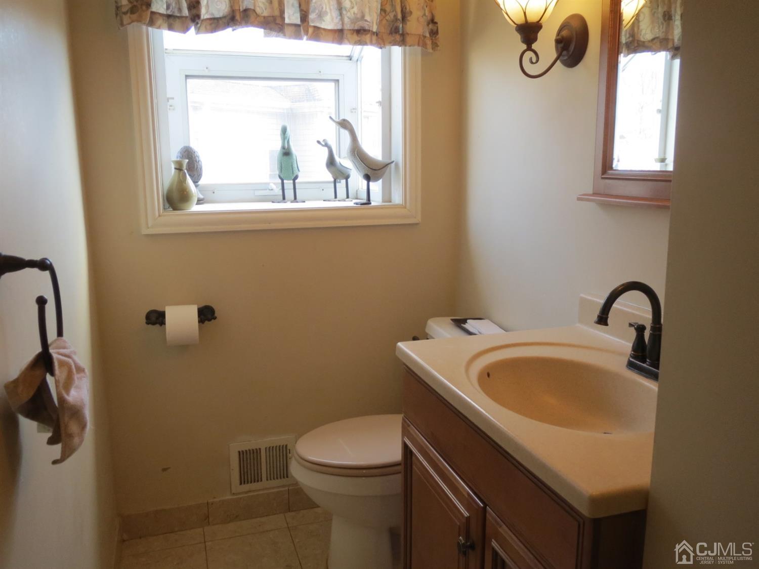 43 Princeton Road Old Bridge, NJ 08859 - Photo 13 of 26 a bathroom with a sink and a toilet