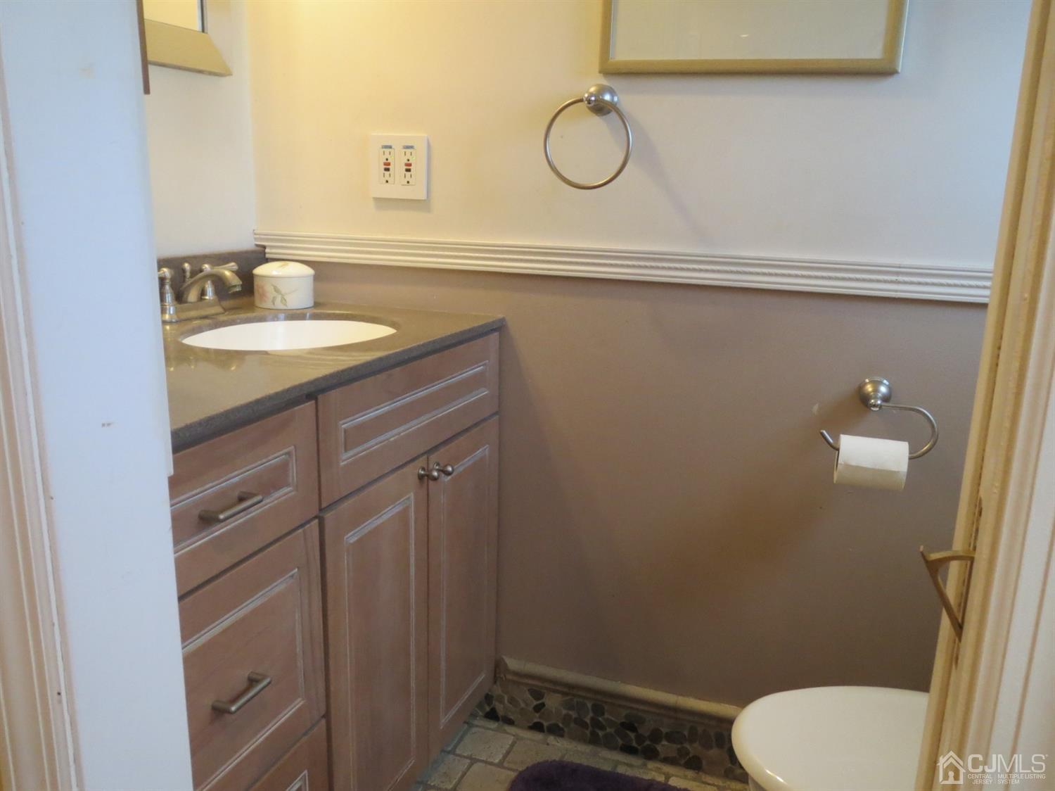 43 Princeton Road Old Bridge, NJ 08859 - Photo 14 of 26 a bathroom with a sink toilet and vanity