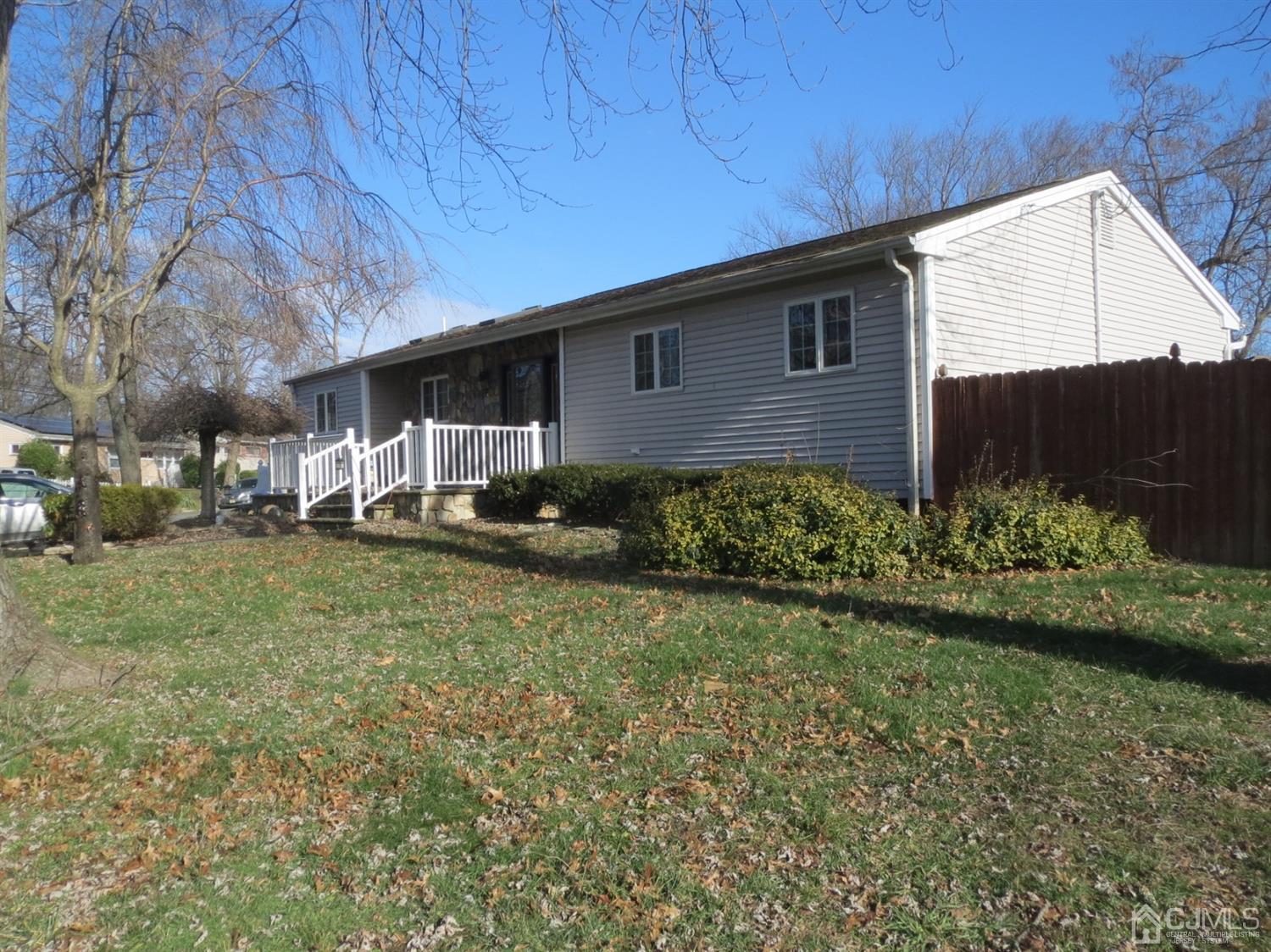 43 Princeton Road Old Bridge, NJ 08859 - Photo 20 of 26 a backyard of a house with lots of green space