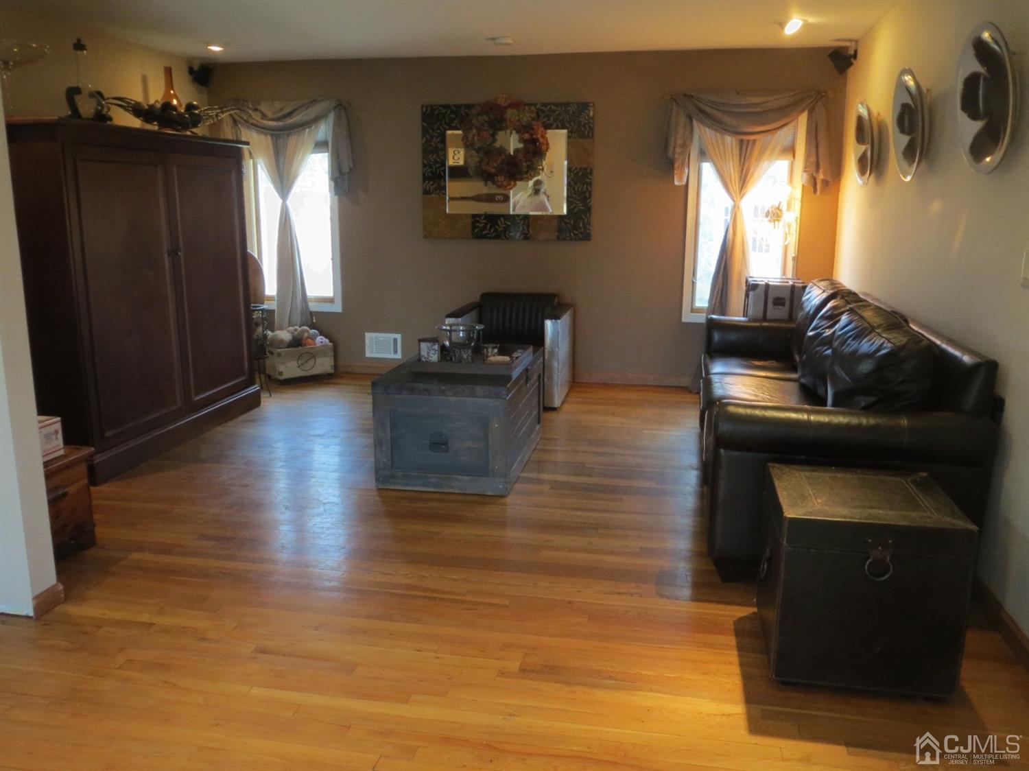 43 Princeton Road Old Bridge, NJ 08859 - Photo 3 of 26 a living room with furniture and a wooden floor