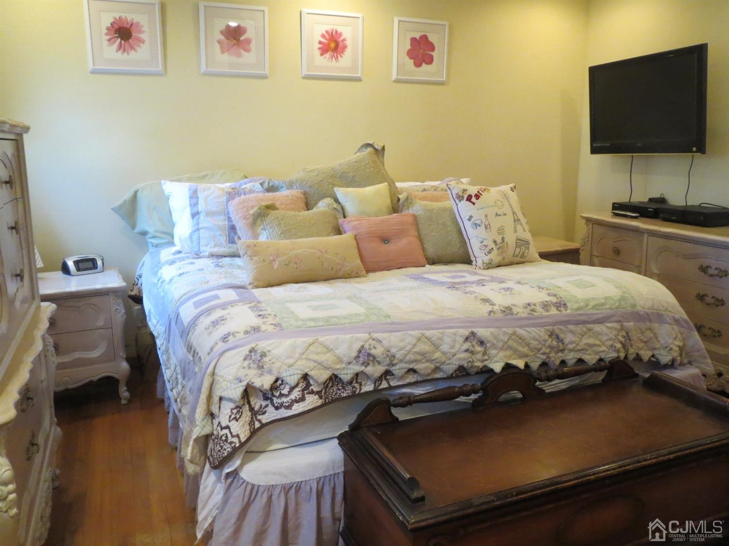 43 Princeton Road Old Bridge, NJ 08859 - Photo 7 of 26 a bedroom with a bed and a flat screen tv