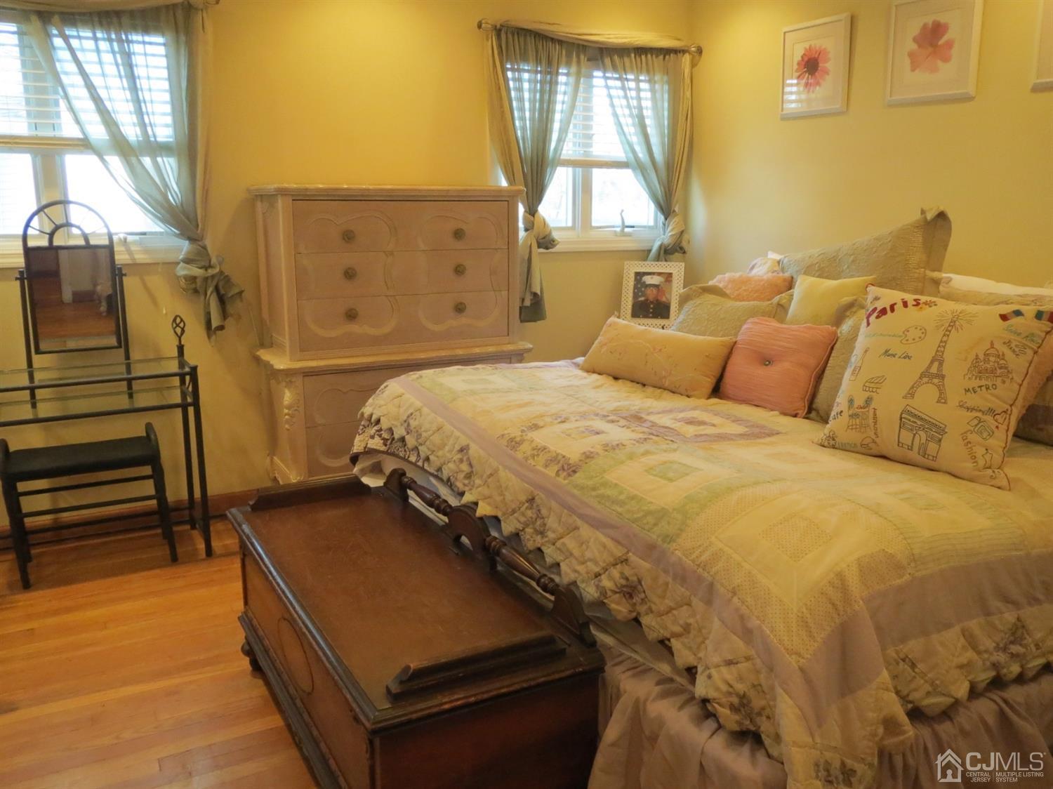 43 Princeton Road Old Bridge, NJ 08859 - Photo 8 of 26 a bedroom with a bed and wooden floor
