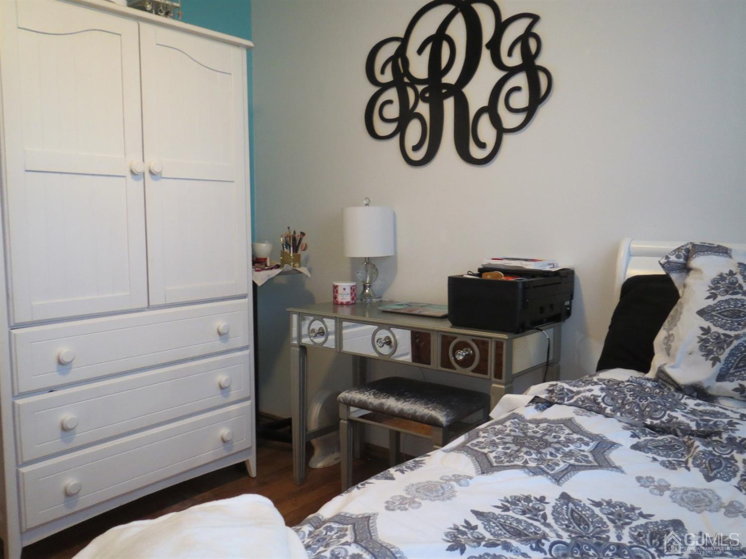 43 Princeton Road Old Bridge, NJ 08859 - Photo 10 of 26 a bedroom with a bed and a dresser