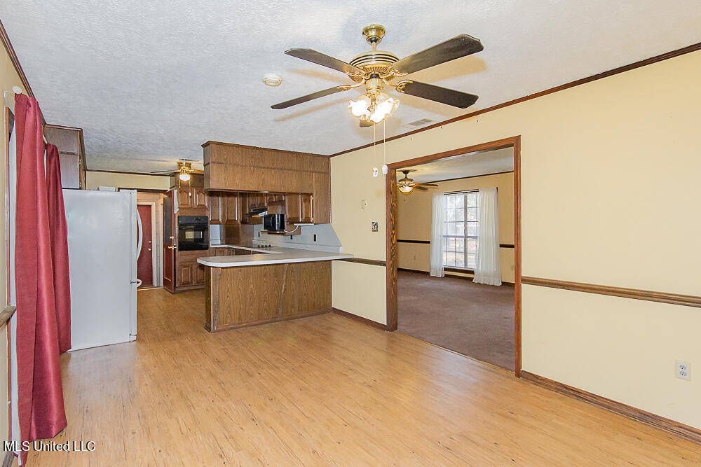 1312 Shell Oil Road Brandon, MS 39042 - Photo 12 of 28 Living Room, Dining Room, Kitchen