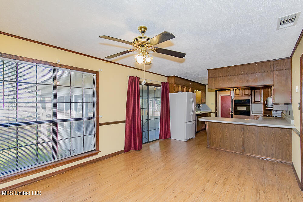 1312 Shell Oil Road Brandon, MS 39042 - Photo 14 of 28 Dining Room Flows into the Kitchen