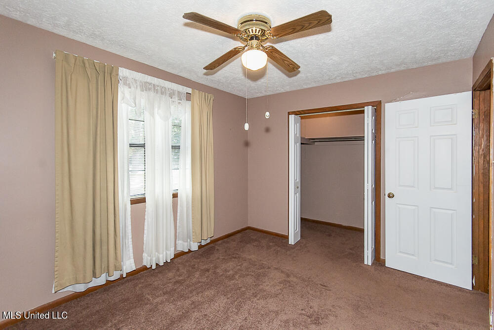 1312 Shell Oil Road Brandon, MS 39042 - Photo 20 of 28 Bedroom with Large Walk-in Closet