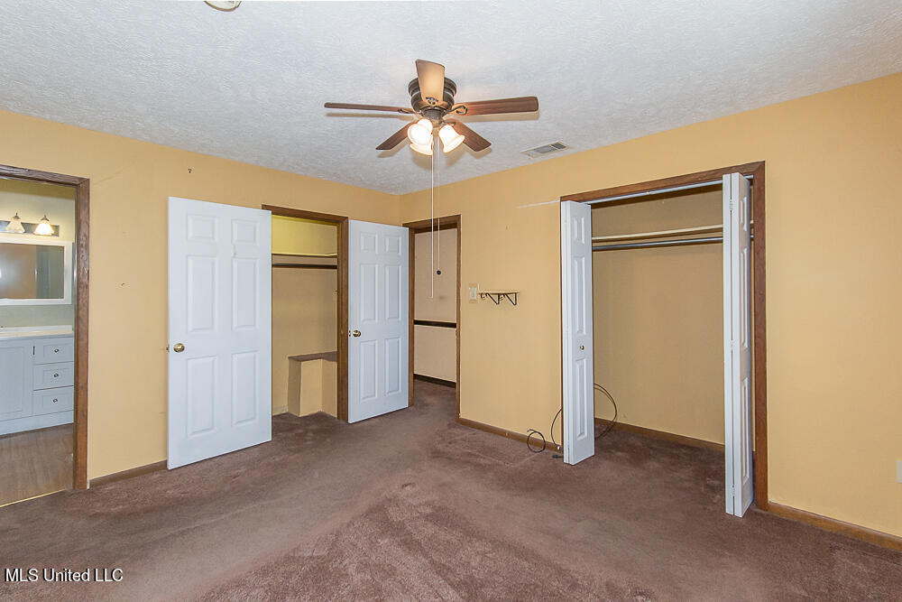 1312 Shell Oil Road Brandon, MS 39042 - Photo 21 of 28 Master Bedroom with Two Walk-In Closets