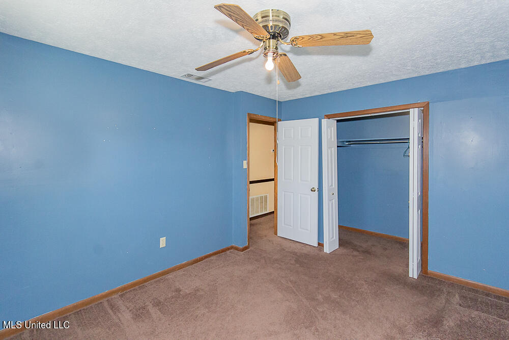 1312 Shell Oil Road Brandon, MS 39042 - Photo 24 of 28 Bedroom with Large Walk-in Closet