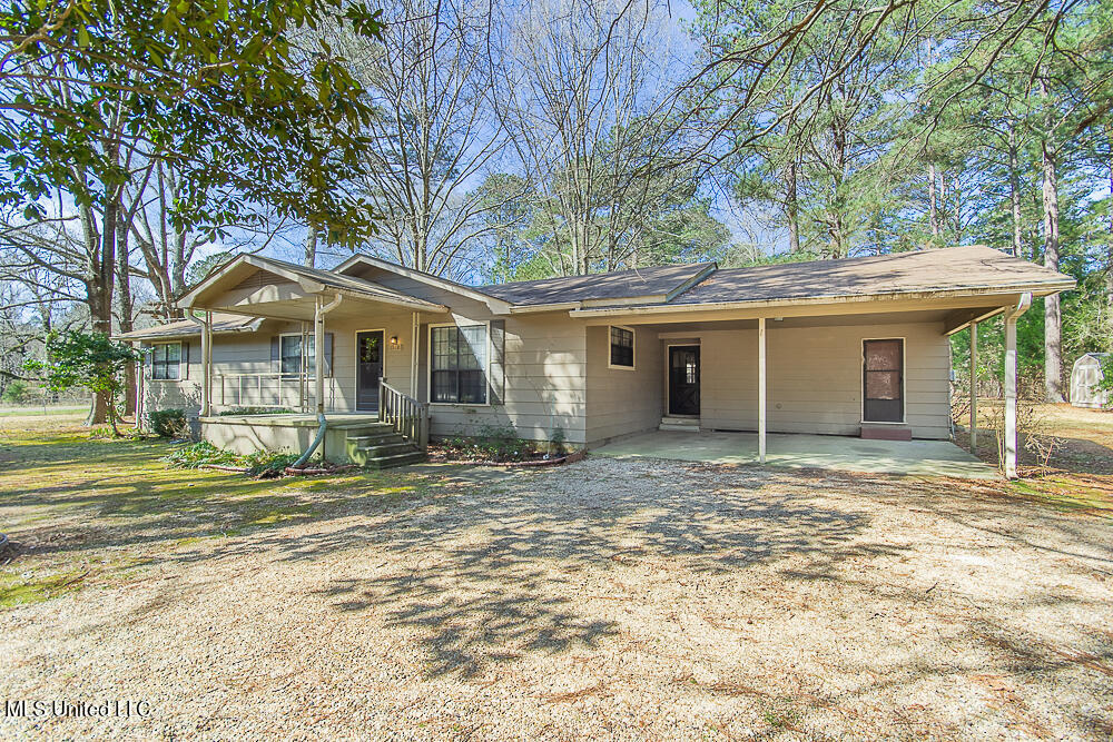 1312 Shell Oil Road Brandon, MS 39042 - Photo 3 of 28 Covered Carport with Storage Room